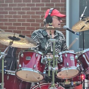 Derek on the drums